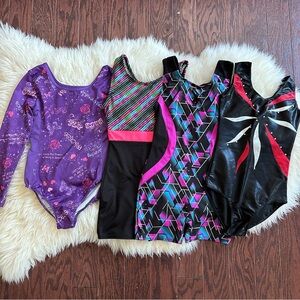 Bundle of 4 girls size 7/8 gymnastics leotards and unitards